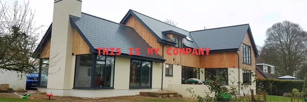 The same house after: new slate roof, timber cladding, render and large glazing